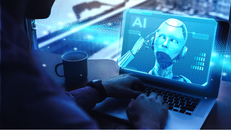 Pessoa digitando em um notebook com a imagem de um robô humanoide e a sigla AI projetadas na tela, ao lado de uma caneca, ilustrando o uso de inteligência artificial no trabalho.